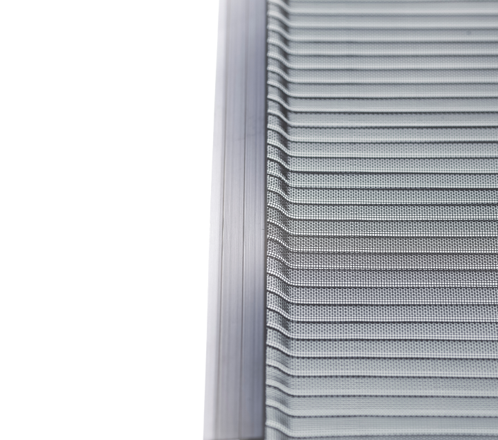 Close-up view of a modern, metallic, ribbed or louvered surface, likely part of an architectural structure or vent, with parallel horizontal lines and a vertical edge on the left side against a white background.